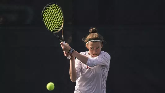 Ava Markham competing during the Big Ten women's tennis tournament