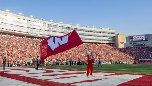 Cheerleader with flag football
