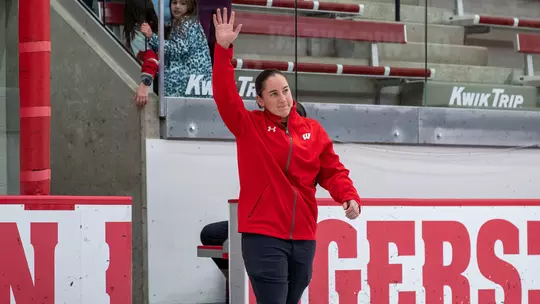 Sis Paulsen waves at the crowd at the Badgers' 2023 NCAA Championship Celebration