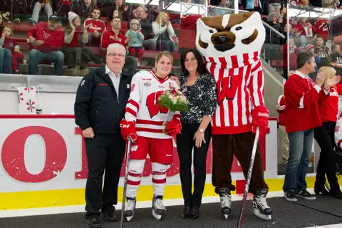Wisconsin Badgers senior Brianna Decker (18) poses with her family prior to an NCAA women's college ice hockey game against the Minnesota Duluth Bulldogs Sunday, February 17, 2013, in Madison, Wis. The Badgers won 3-2 (OT)