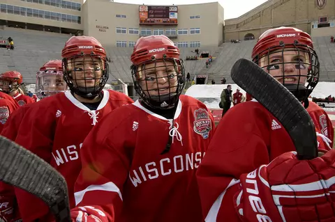 Wisconsin women's hockey teammates Brianna Decker and Saige Pacholok inside Camp Randall Stadium on the ice for the game vs. St. Cloud State on Saturday, March 2, 2013, in Madison, Wis. The Badgers won 4-1.