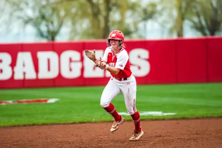 Ellie Hubbard clapping as she rounds the bases