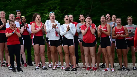 Women's rowers cheering