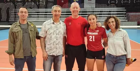 Gulce Guctekin, Wisconsin volleyball, and her family together with UW head coach Kelly Sheffield on the 2023 European Tour