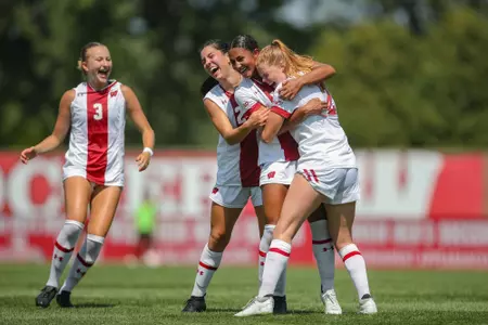 Ella Ottey, Emma Jaskaniec, Ashley Martinez and Aidan McConnell celebrate after a goal
