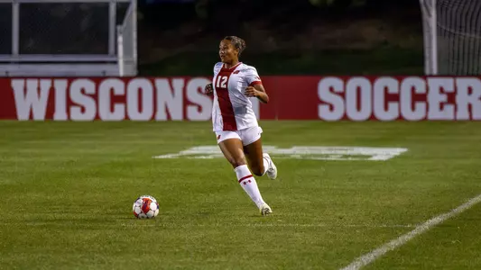 Ella Ottey Kicks the ball in contest against Kansas