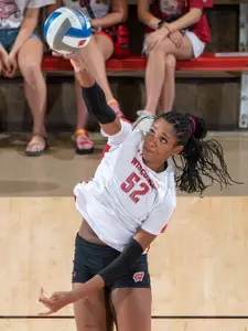 Carter Booth serves up the ball