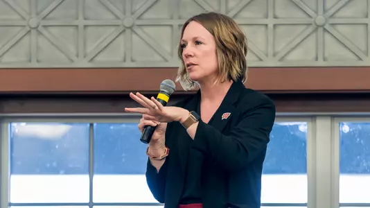 Bridget Woodruff, Associate Athletic Director for Organizational Effectiveness, speaking at a recent Athletics staff event