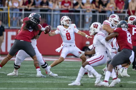 Wisconsin Badgers quarterback Tanner Mordecai (8) throws the ball during an NCAA college football game against the Washington State Cougars, Saturday, Sept. 9, 2023, in Pullman, Wash. The Cougars won 31-22. (Photo by David Stluka/Wisconsin Athletic Communications)