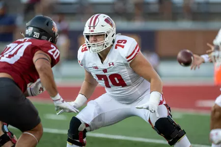 Wisconsin Badgers offensive lineman Jack Nelson (79) blocks during an NCAA college football game against the Washington State Cougars, Saturday, Sept. 9, 2023, in Pullman, Wash. The Cougars won 31-22. (Photo by David Stluka/Wisconsin Athletic Communications)