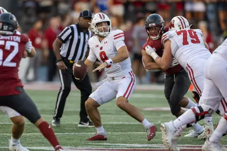 iWisconsin Badgers quarterback Tanner Mordecai (8) throws the ball during an NCAA college football game against the Washington State Cougars, Saturday, Sept. 9, 2023, in Pullman, Wash. The Cougars won 31-22. (Photo by David Stluka/Wisconsin Athletic Communications)