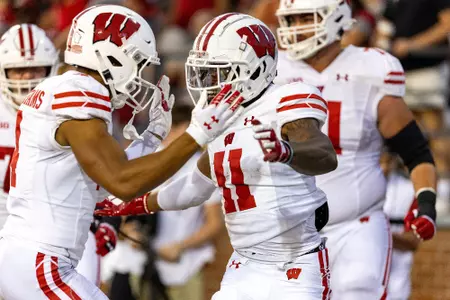 Wisconsin Badgers wide receiver Skyler Bell (11) celebrates a touchdown during an NCAA college football game against the Washington State Cougars, Saturday, Sept. 9, 2023, in Pullman, Wash. The Cougars won 31-22. (Photo by David Stluka/Wisconsin Athletic Communications)