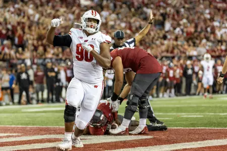 Wisconsin Badgers defensive lineman James Thompson Jr. (90) celebrates a quarterback sack during an NCAA college football game against the Washington State Cougars, Saturday, Sept. 9, 2023, in Pullman, Wash. The Cougars won 31-22. (Photo by David Stluka/Wisconsin Athletic Communications)