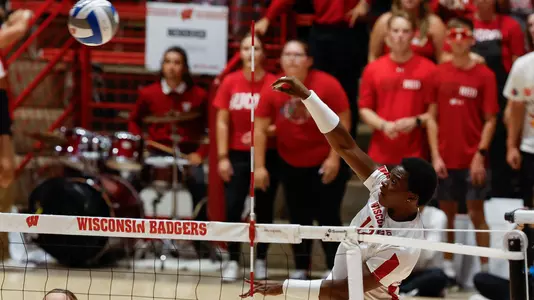 Temi Thomas attacks the ball against Arizona