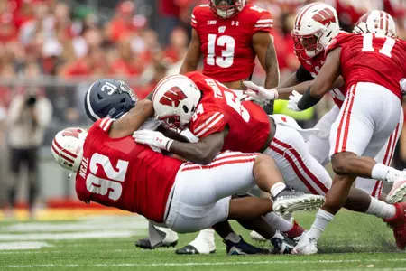 Wisconsin Badgers nose tackle Curt Neal (92) makes a tackle during NCAA college football game against the Georgia Southern Eagles, Saturday, Sept. 16, 2023, in Madison, Wis.