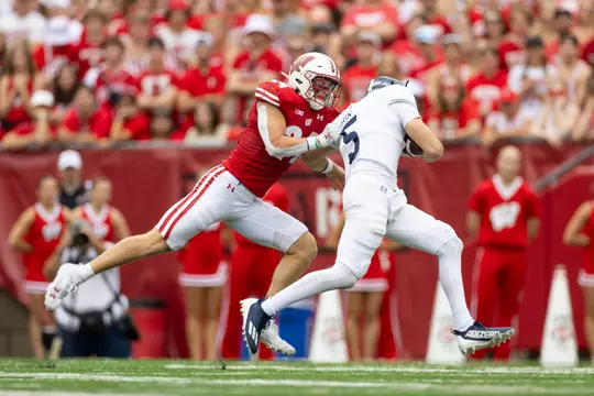 Wisconsin Badgers safety Hunter Wohler (24) tackles Georgia Souther quarterback during an NCAA college football game, Saturday, Sept. 16, 2023, in Madison, Wis.