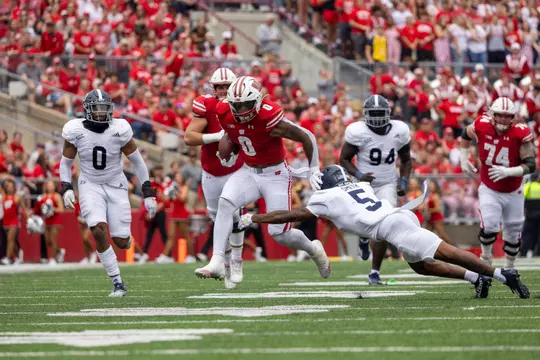 Braelon Allen beats a defender running downfield to score a touchdown during the Wisconsin football game against Georgia Southern at Camp Randall Stadium in Madison, Wisconsin on Saturday, Sept. 16, 2023. The Badgers defeated the Eagles 35-14.