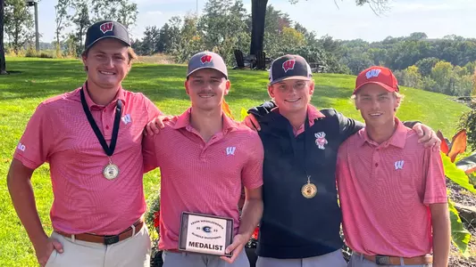 Graham Moody, Daniel Aas, Carter Pitcairn and James Boustead of Wisconsin men's golf following the Wrigglesworth Invitational in Eau Claire, Wisconsin