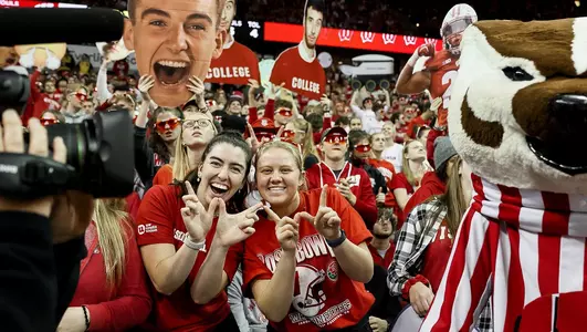 Fans in the AreaRED student section at the Kohl Center