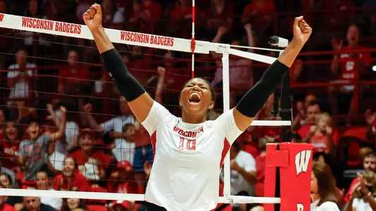 Devyn Robinson celebrates after winning a point