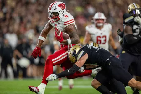 Wisconsin running back Braelon Allen (0) evades the Purdue defense to score a touchdown during the Badgers 38-17 road victory over the Boilermakers on Friday, Sept. 22, 2023, in West Lafayette, Indiana.