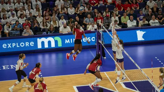 Temi Thomas-Ailara hits the ball in match vs Northwestern