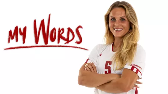 Dara Andringa, Wisconsin Women's Soccer, headline image of Dara smiling with arms crossed looking at camera and "My Words" script logo in red