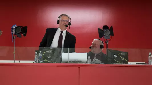 Brian Posick in the booth calling a game