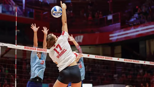 Ella Wrobel hits the ball during exhibition match vs UIC