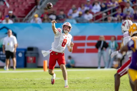 Wisconsin quarterback Tanner Mordecai throws the ball downfield during the NCAA football game against LSU for the 2024 ReliaQuest Bowl on Monday, January 1, 2024 in Tampa, Florida.
