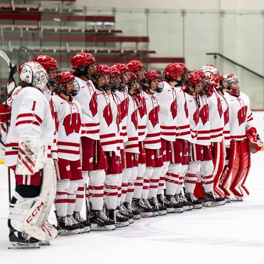 The Badgers celebrate a win at LaBahn Arena