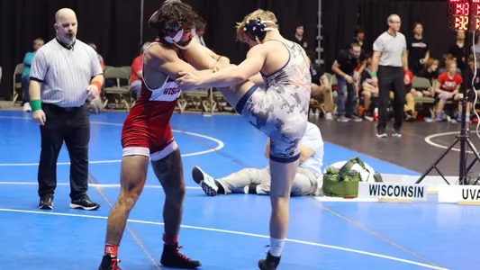 Joseph Zargo, Wisconsin Wrestling, holds the leg of his Virginia opponent Luke Roberts en route to winning by pin in 5:33 during the Badgers' dual match against the Cavaliers at the 2024 Virginia Duals on Saturday, Jan. 13, 2024 at Hampton, Coliseum in Hampton, Va. The Badgers won 27-13.