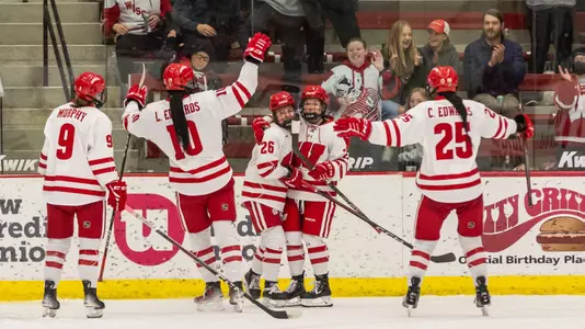 Wisconsin women's hockey celebrates a goal against St. Thomas on Jan. 13, 2024