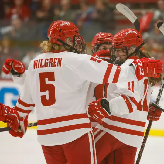 Women's Hockey Celebrates a goal against St. Thomas