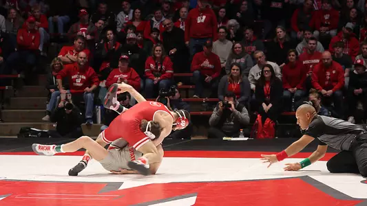 Eric Barnett, Wisconsin wrestling, pins Ohio State's Brendan McCrone in 32 seconds during the Badgers home dual match vs. the Buckeyes on Sunday, Jan. 21, 2024 at the UW Field House in Madison, Wis.