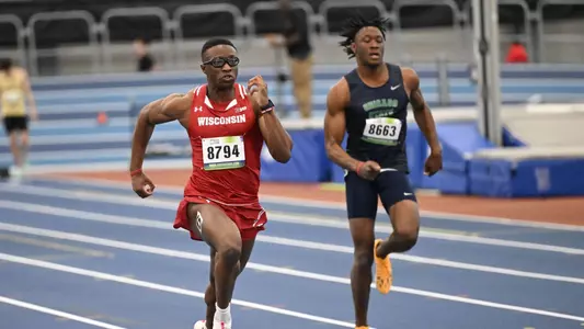 Sam Amusan runs the 60 meter dash at the Chicago Midwest Invitational