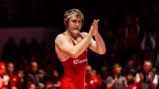 Shane Liegel, Wisconsin Wrestle, celebrates his victory during Wisconsin's dual match against No. 7 Ohio State on Sunday, Jan. 21 at the UW Field House in Madison, Wisconsin. Liegel earned a 14-3 major decision over Seth Shumate.