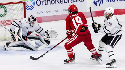Quinn Finley makes a shot on the Omaha netminder