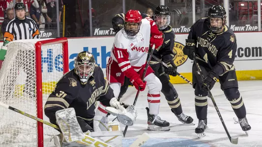 Simon Tassy in front of the net against Lindenwood
