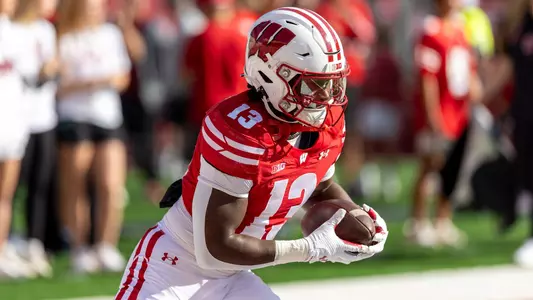 Wisconsin Badgers running back Darrion Dupree (13) returns a kick during warmups prior to a Big Ten Conference NCAA college football game against the Purdue Boilermakers, Saturday, Oct. 5, 2024, in Madison, Wis. The Badgers won 52-6. (Photo by David Stluka/Wisconsin Athletic Communications)