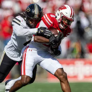 Wisconsin Badgers wide receiver Vinny Anthony II (8) carries the ball during a Big Ten Conference NCAA college football game against the Purdue Boilermakers, Saturday, Oct. 5, 2024, in Madison, Wis. The Badgers won 52-6. (Photo by David Stluka/Wisconsin Athletic Communications)