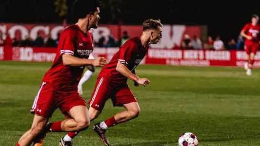 Noah Glorioso dribbles the ball forward