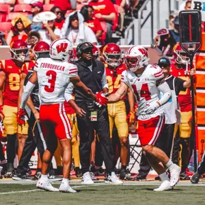 Hunter Wohler and Nyzier Fourqurean celebrate a big stop against USC on September 28, 2024