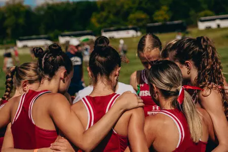 The women's cross country teams prepares for the Nuttycombe Wisconsin Invitational on Sept. 27.