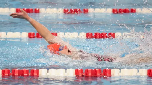 Phoebe Bacon swims the backstroke