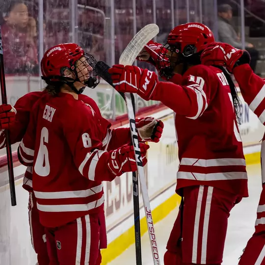 Lacey Eden and Laila Edwards celebrate a goal
