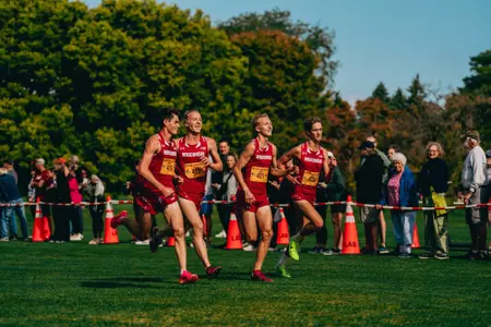 Johnny Livingstone, Micah Wilson, Christian de Vaal and Liam Newhart running at the Sean Earl Lakefront Invitational