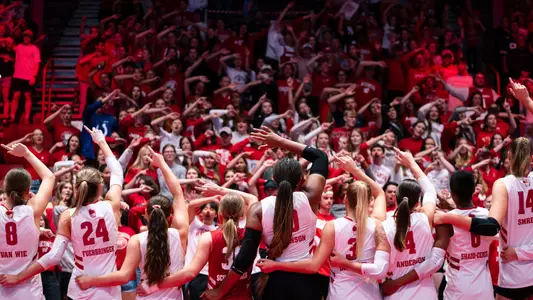 Team sings Varsity with the student section