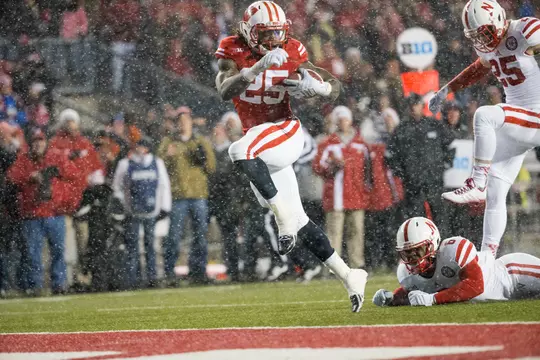 Wisconsin Badgers running back Melvin Gordon (25) scores on a 26-yard run to set the NCAA single-game rushing record with 408 yards during an NCAA football game against the Nebraska Cornhuskers Saturday, November 15, 2014, in Madison, Wis. (Photo by David Stluka)