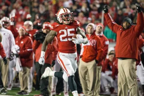Wisconsin Badgers running back Melvin Gordon (25) carries the ball during an NCAA football game against the Nebraska Cornhuskers Saturday, November 15, 2014, in Madison, Wis. Gordon set the NCAA single-game rushing record with 408 yards. (Photo by David Stluka)
